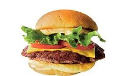 ChopYard burger with beef, cheese, lettuce, and tomato